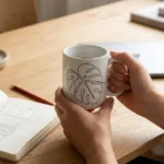 Monstera Mug on the table