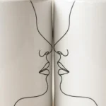 Two Faces Mug Pair, close-up of the line drawing