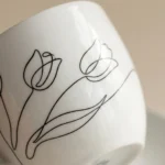 Tulip Tea Cup & Saucer, close-up of the line drawing
