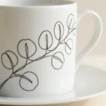 Eucalyptus Tea Cup & Saucer, close-up of the line drawing